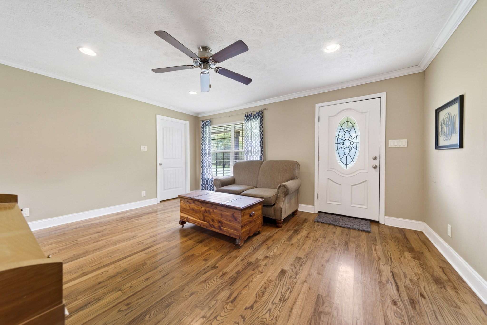8023 Bethlehem Road Springfield, TN 37172 - Photo 25 of 55 a living room with furniture and a wooden floor
