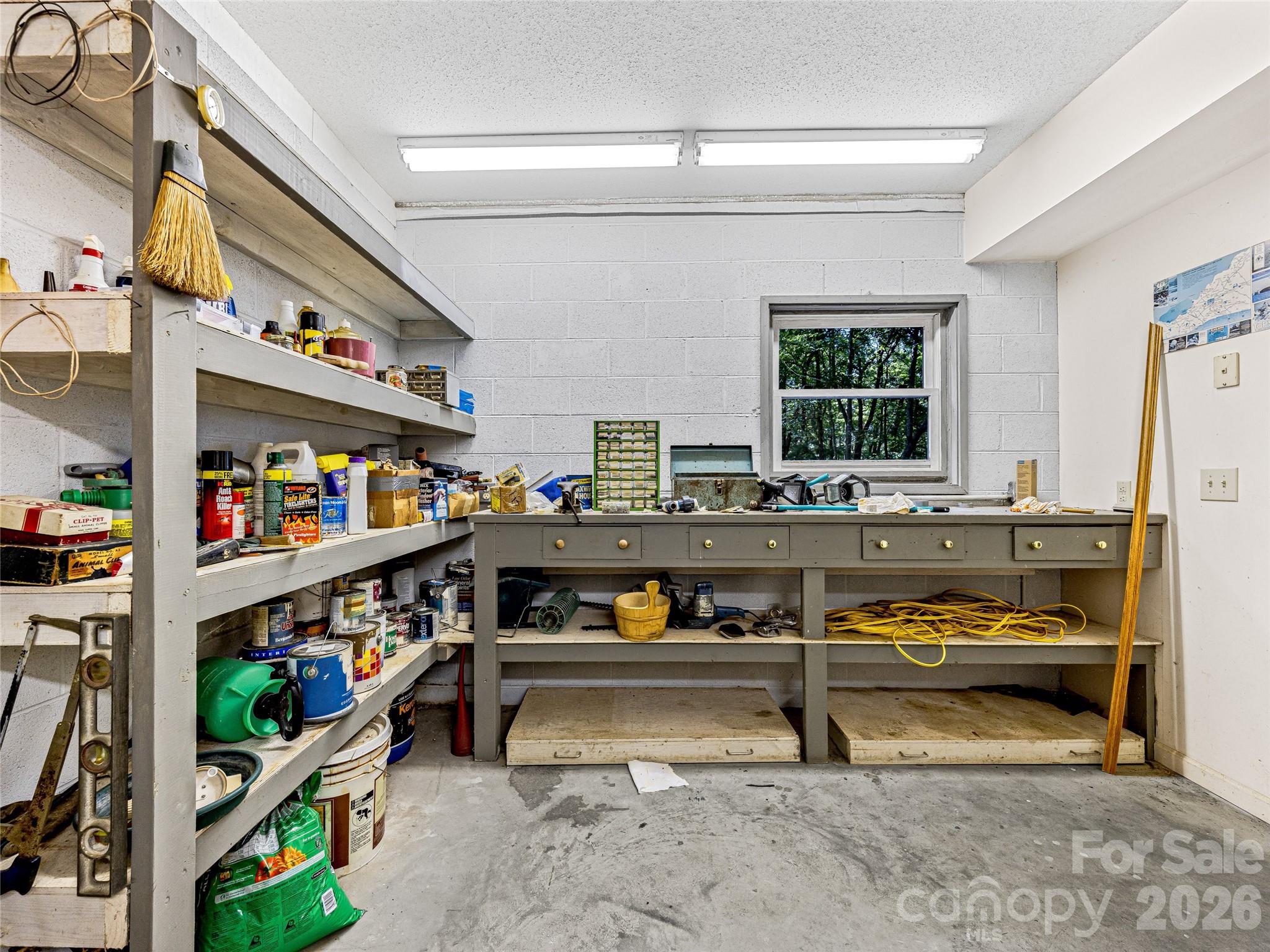 796 Hawk Mountain Road, Unit 36R Lake Toxaway, NC 28747 - Photo 36 of 39 a outdoor space with lots of furniture and white walls