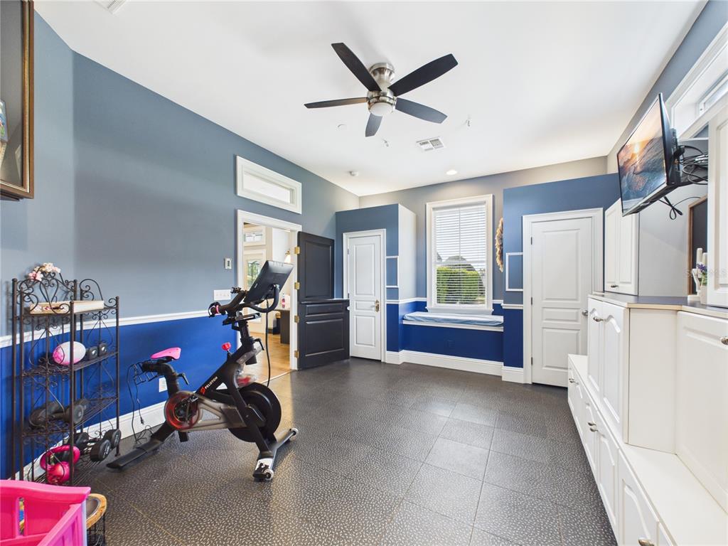 2215 Southwest 80th Street Ocala, FL 34476 - Photo 18 of 64 a view of a room with gym equipment
