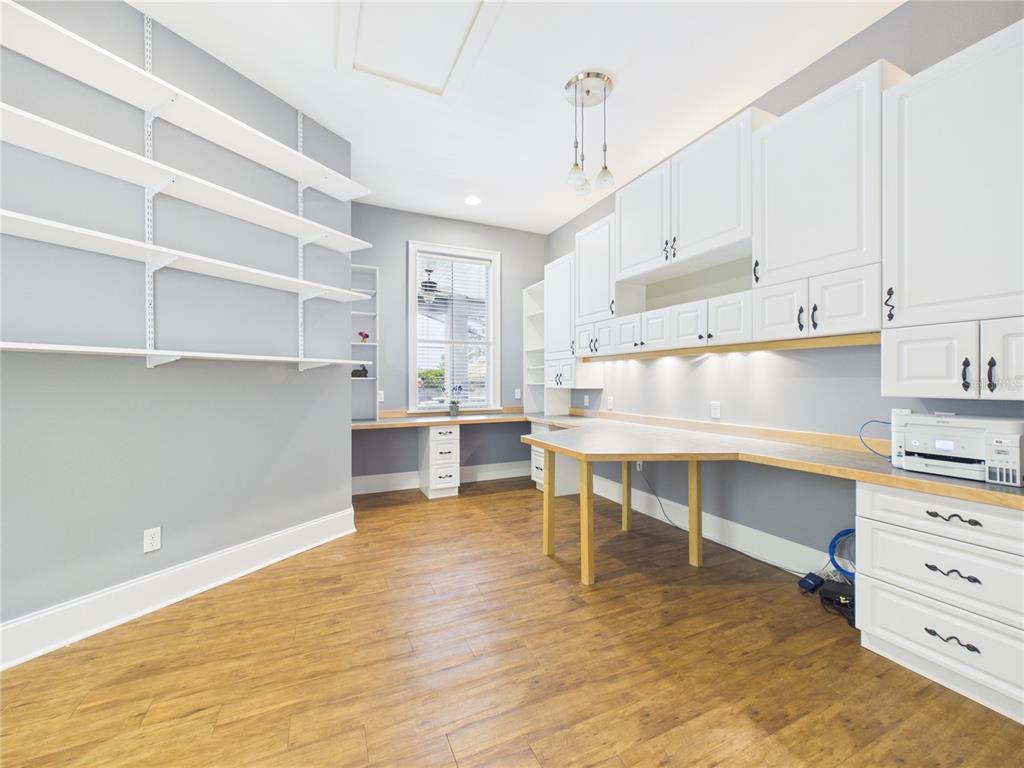 2215 Southwest 80th Street Ocala, FL 34476 - Photo 26 of 64 a view of kitchen with kitchen island and stainless steel appliances