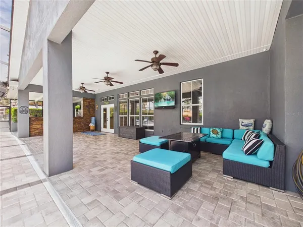 swimming pool view with a garden