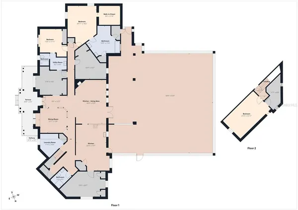 an aerial view of a house with a swimming pool