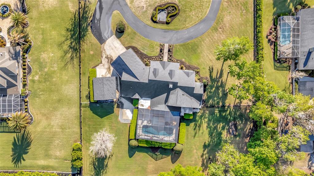 2215 Southwest 80th Street Ocala, FL 34476 - Photo 54 of 64 an aerial view of a house with a swimming pool