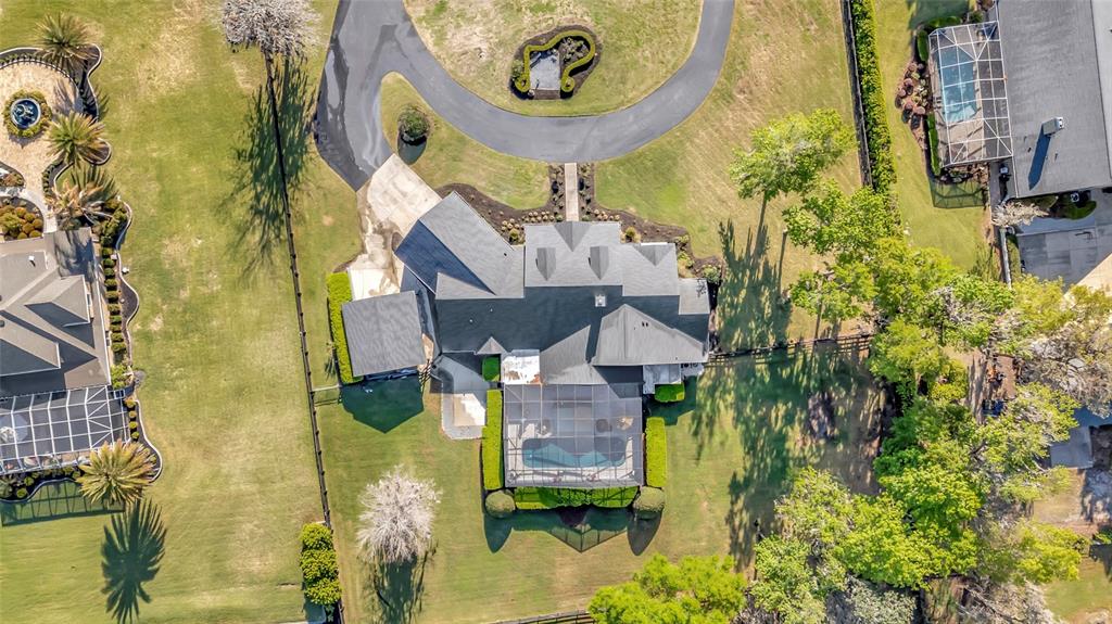 2215 Southwest 80th Street Ocala, FL 34476 - Photo 55 of 64 a aerial view of a house with a swimming pool