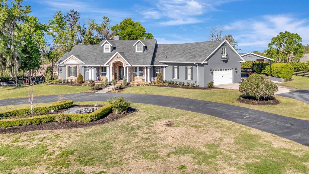 2215 Southwest 80th Street Ocala, FL 34476 - Photo 63 of 64 front view of a house with a yard