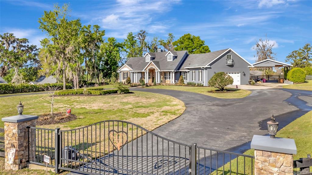 2215 Southwest 80th Street Ocala, FL 34476 - Photo 64 of 64 a view of a house with a swimming pool