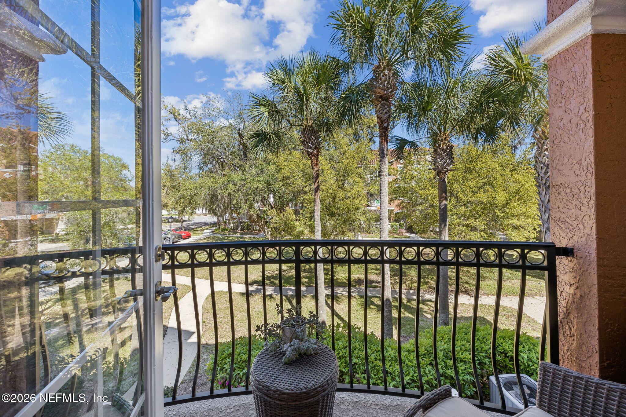 96122 Roddenberry Way Fernandina Beach, FL 32034 - Photo 13 of 39 a view of a balcony with potted plants