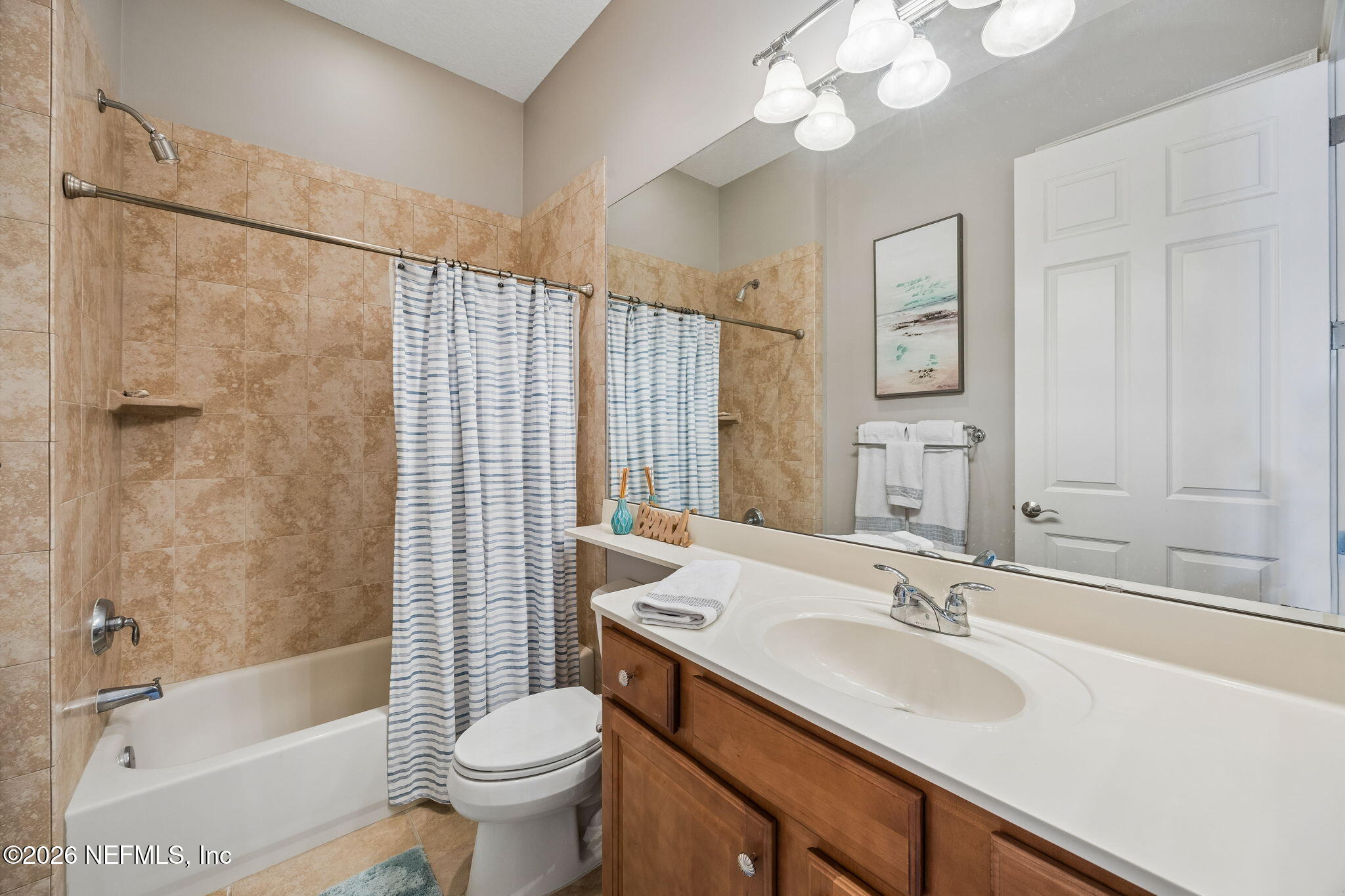 96122 Roddenberry Way Fernandina Beach, FL 32034 - Photo 20 of 39 a bathroom with a sink toilet tub and shower