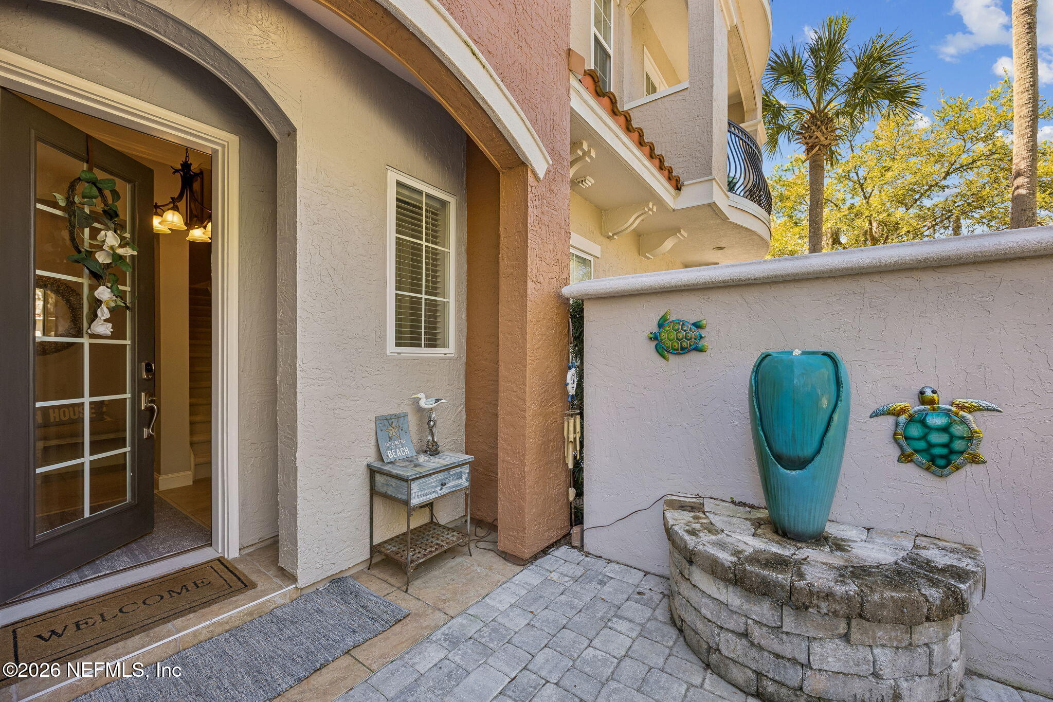 96122 Roddenberry Way Fernandina Beach, FL 32034 - Photo 4 of 39 a view of a door and chair in the balcony