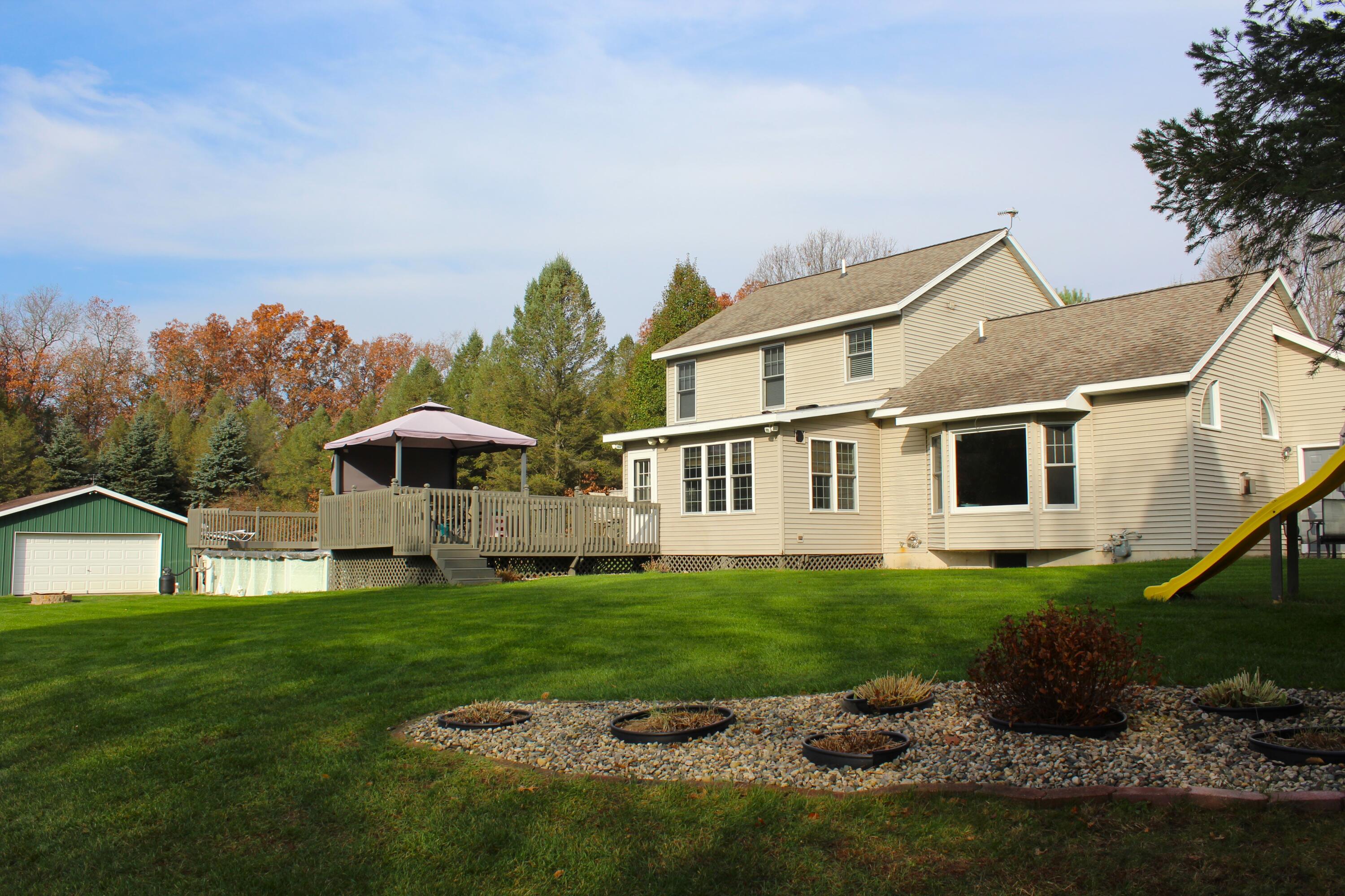 10038 Riley Lane Greenville, MI 48838 - Photo 10 of 35 Back of Home