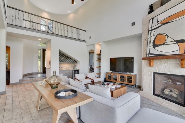 a view of a house with swimming pool