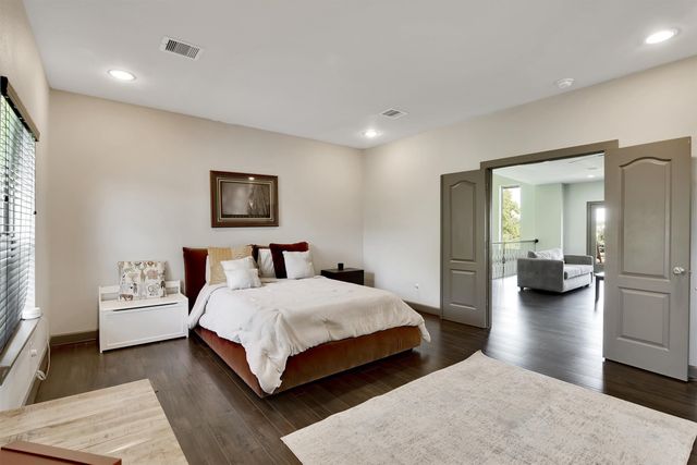 a very nice looking living room with furniture and a large window