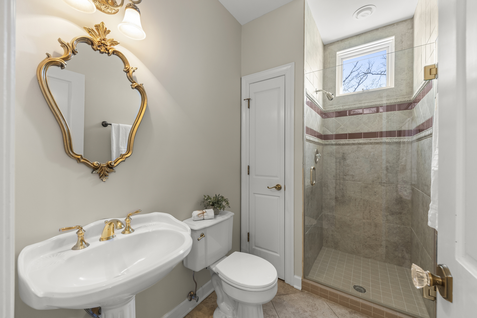 1S151 Winfield Road Wheaton, IL 60189 - Photo 25 of 73 a bathroom with a toilet sink and mirror