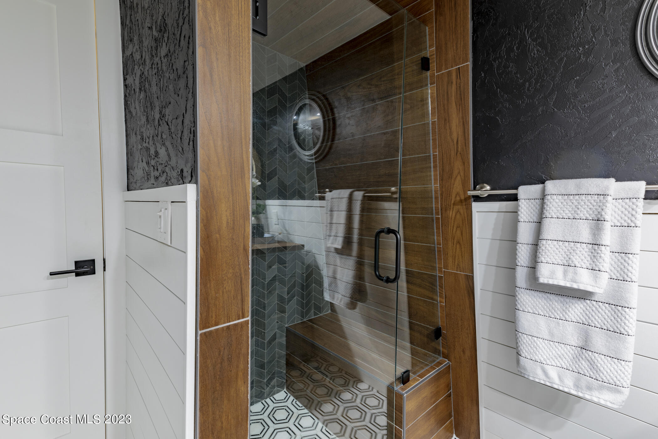 1428 Rose Court Melbourne, FL 32935 - Photo 41 of 78 a bathroom with a shower