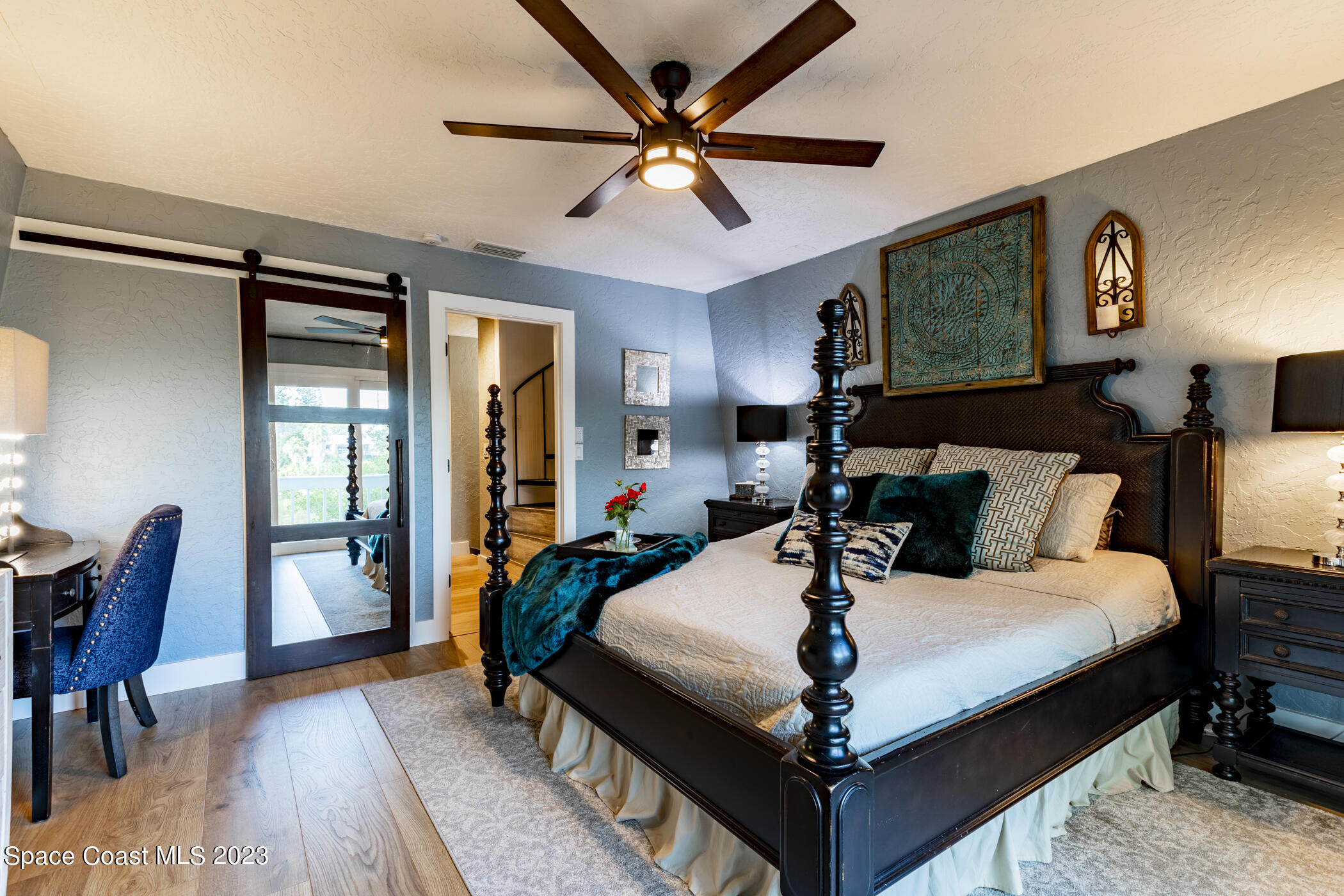 1428 Rose Court Melbourne, FL 32935 - Photo 48 of 78 a bed room with a bed and a chair