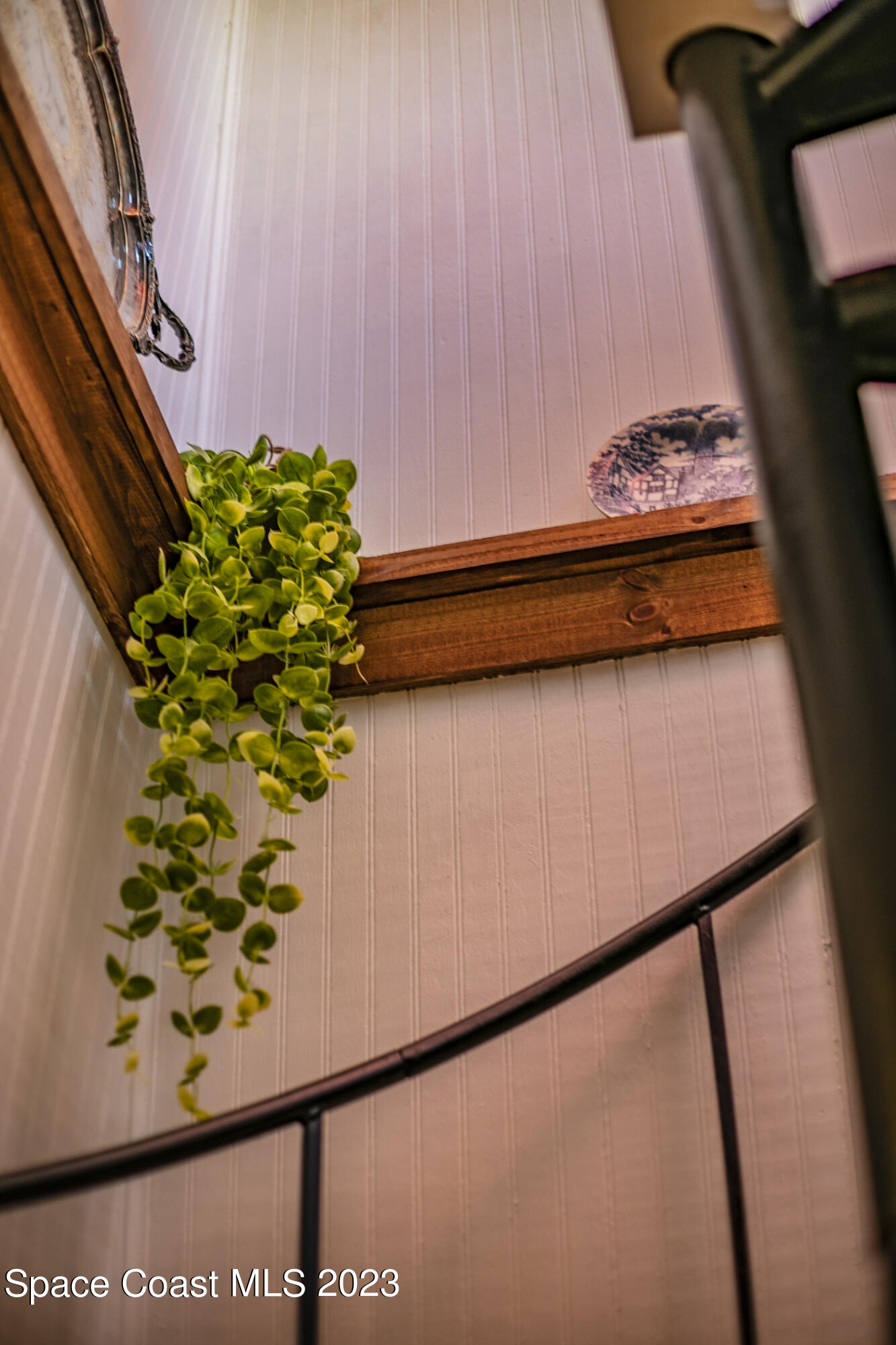 1428 Rose Court Melbourne, FL 32935 - Photo 64 of 78 3rd Story Spiral Staircase