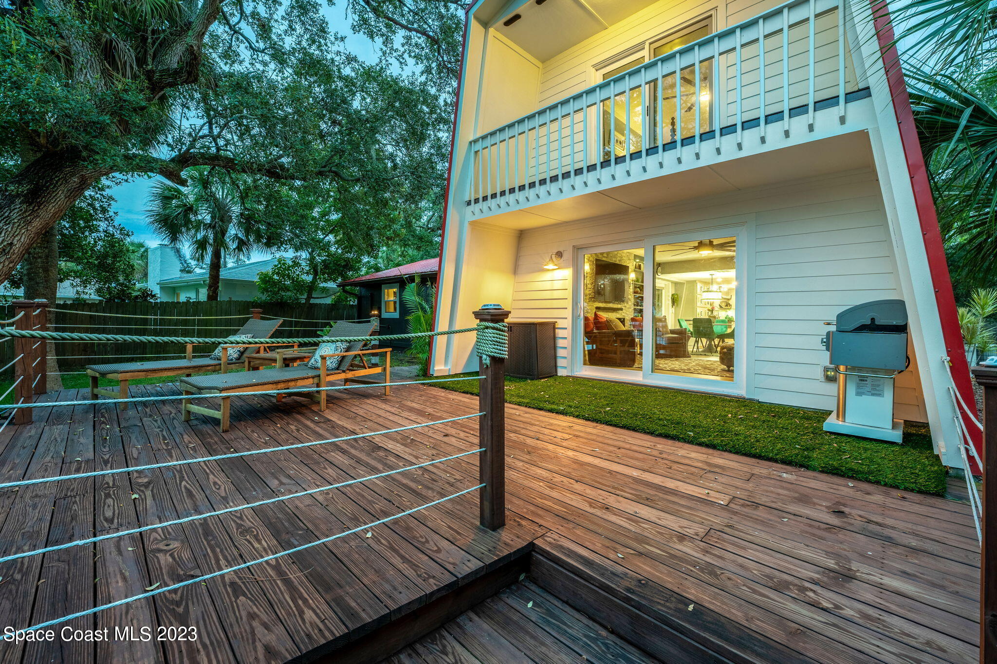 1428 Rose Court Melbourne, FL 32935 - Photo 67 of 78 a tennis court with view of trees in the background