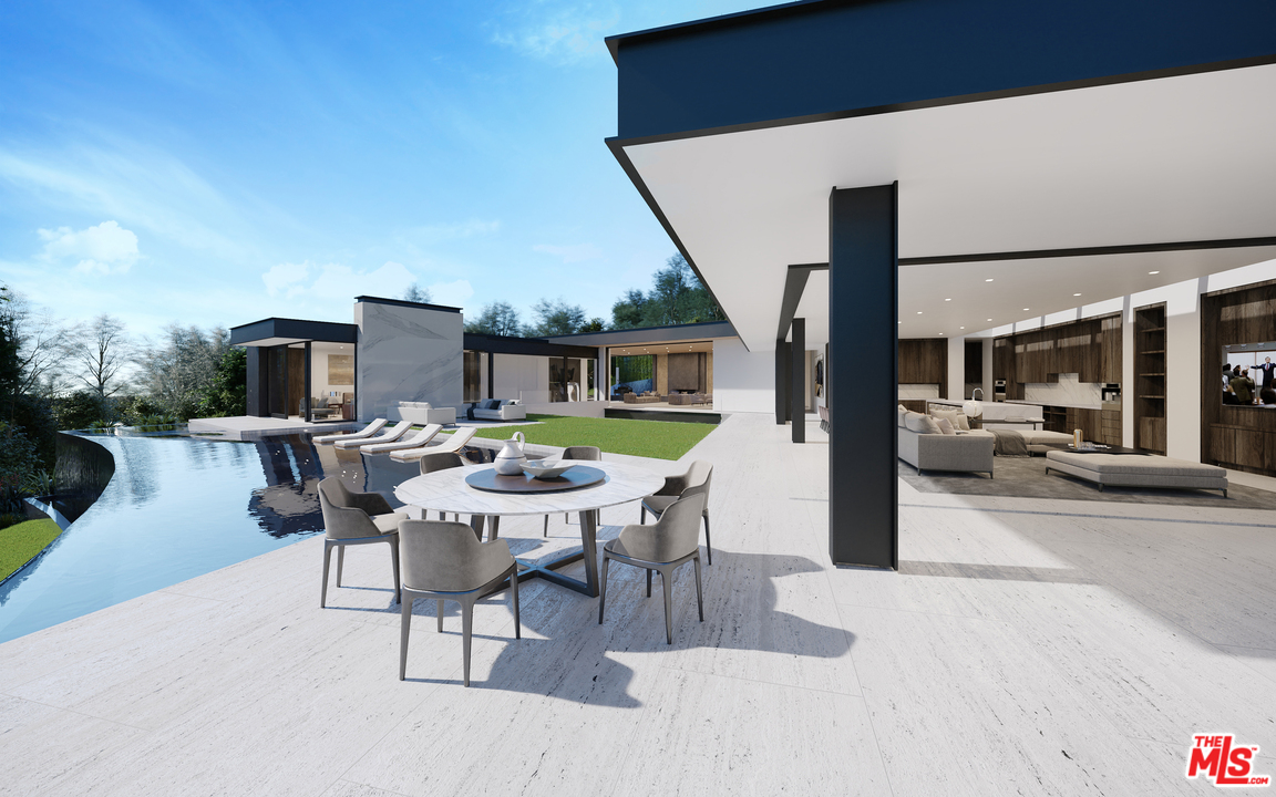 1200 Laurel Way Beverly Hills, CA 90210 - Photo 11 of 16 a view of a patio with a table and chairs