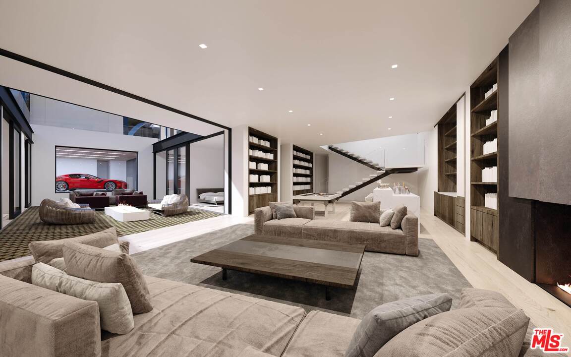 1200 Laurel Way Beverly Hills, CA 90210 - Photo 14 of 16 a living room with furniture and a wooden floor