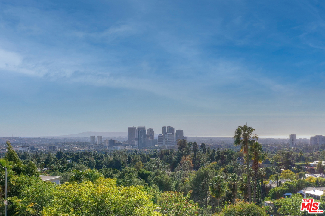 1200 Laurel Way Beverly Hills, CA 90210 - Photo 4 of 16 a view of a city with tall buildings in the background