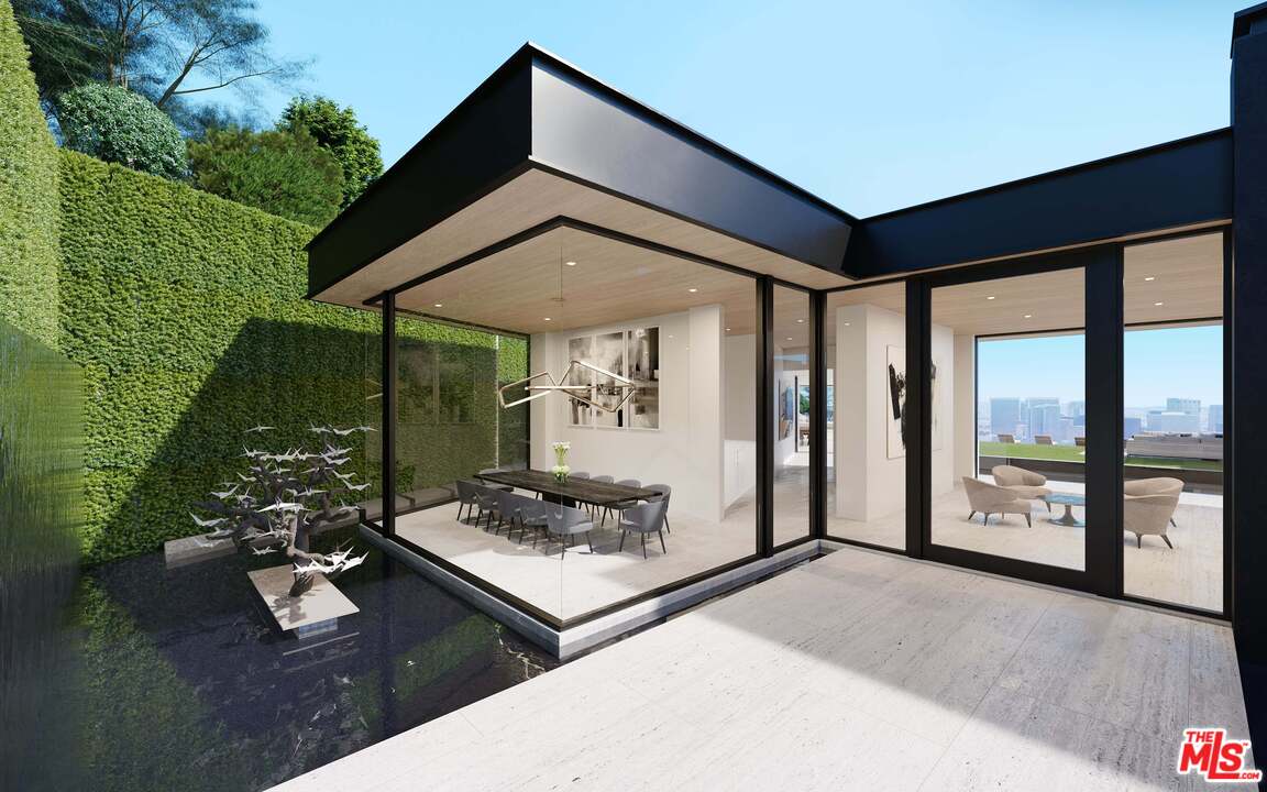 1200 Laurel Way Beverly Hills, CA 90210 - Photo 8 of 16 a living room with patio furniture and a floor to ceiling window