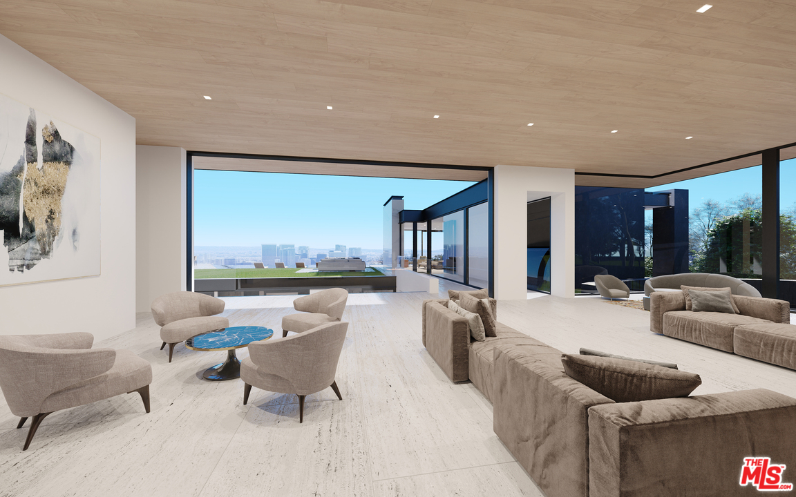 1200 Laurel Way Beverly Hills, CA 90210 - Photo 9 of 16 a living room with furniture and a large window