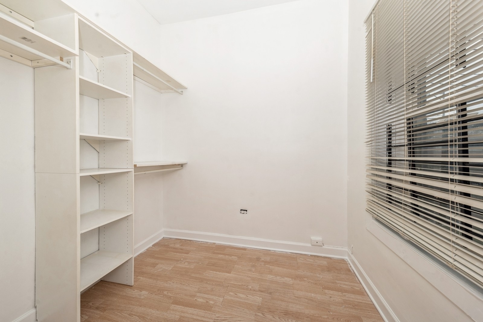 2242 West 19th Street, Unit 1R Chicago, IL 60608 - Photo 11 of 13 a view of a room with shelf