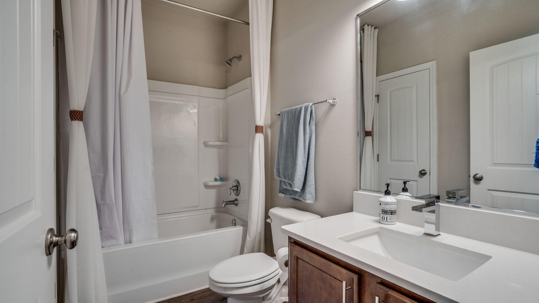 260 Cornelia Street Freeport, FL 32439 - Photo 21 of 42 a bathroom with a sink toilet tub and shower