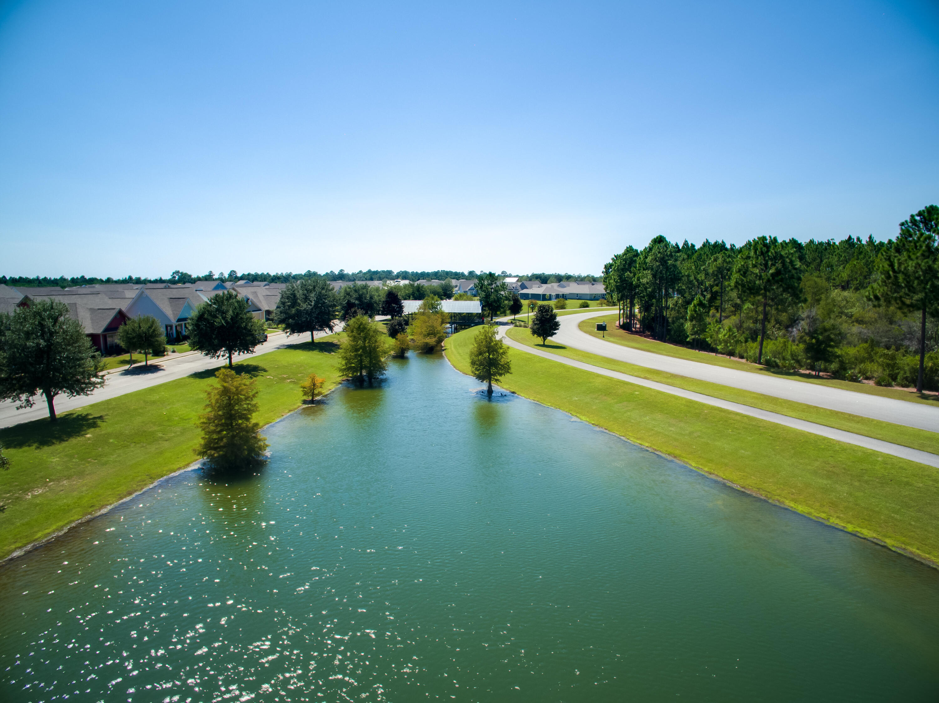 260 Cornelia Street Freeport, FL 32439 - Photo 38 of 42 a view of a lake with a yard