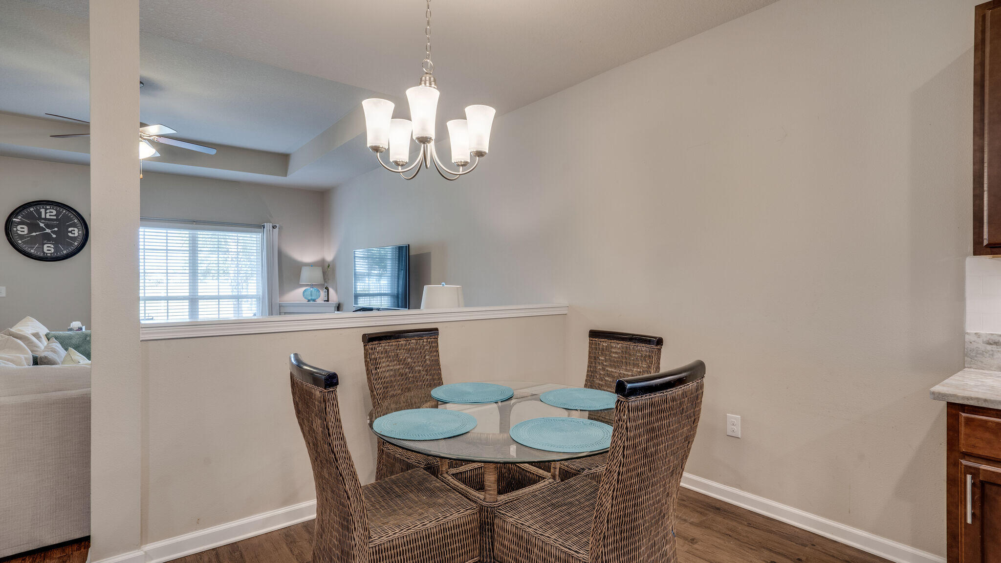 260 Cornelia Street Freeport, FL 32439 - Photo 10 of 42 a view of a dining room with furniture and a chandelier