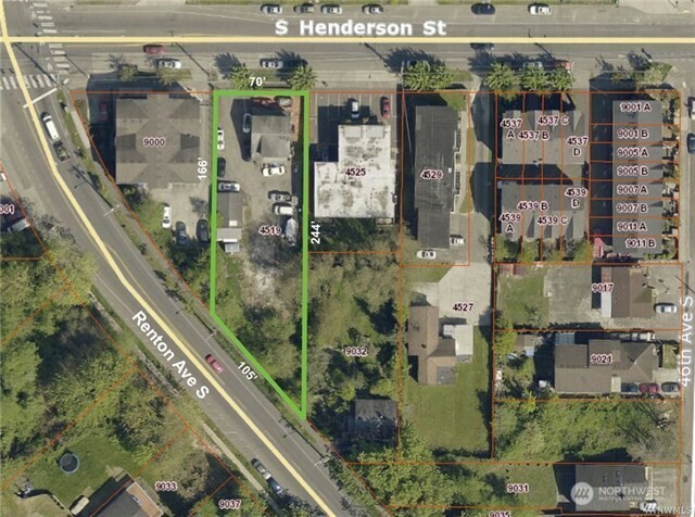 a bathroom with a glass shower door and a sink