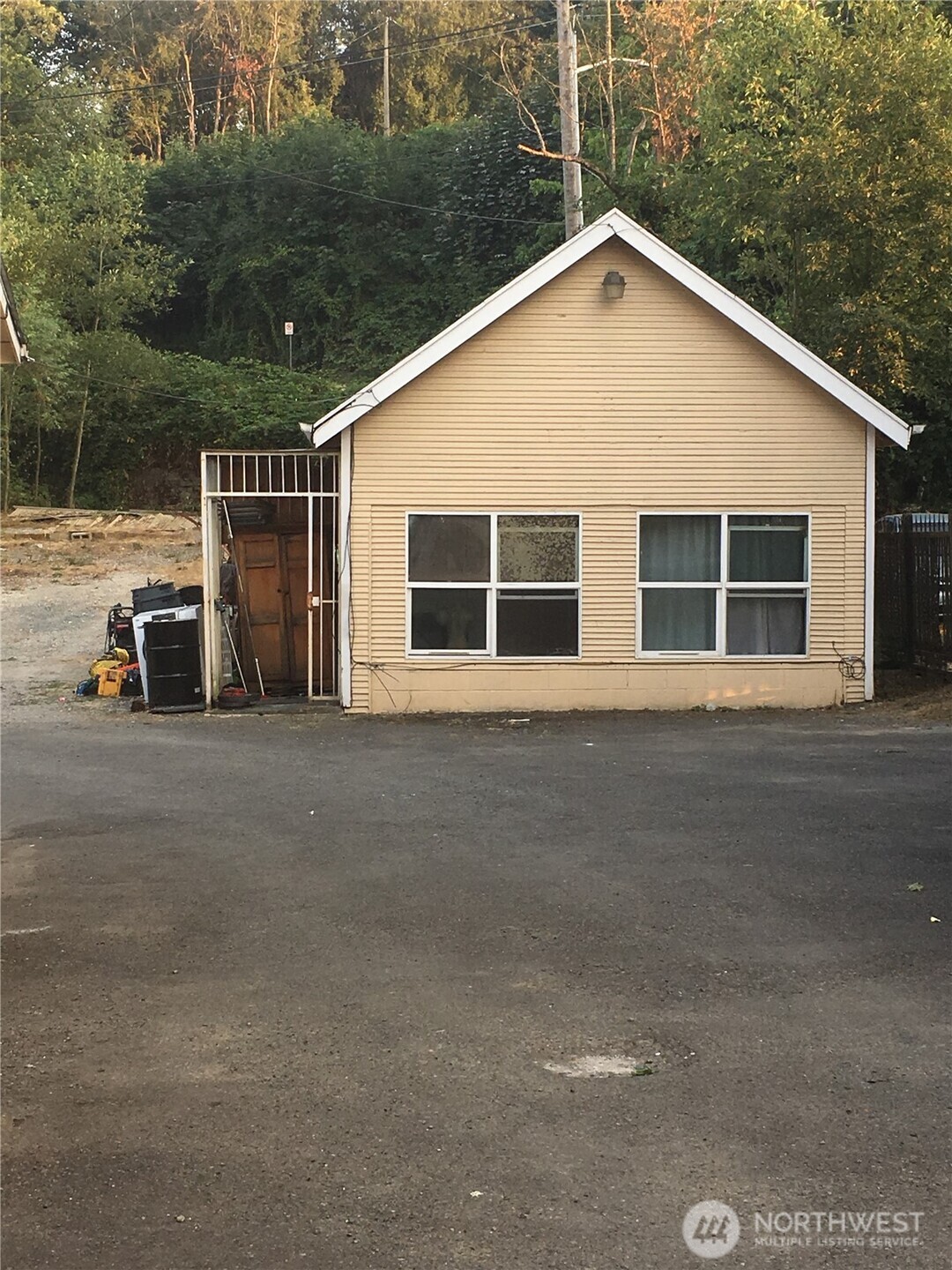4519 South Henderson Street Seattle, WA 98118 - Photo 3 of 6 a view of a house with a yard