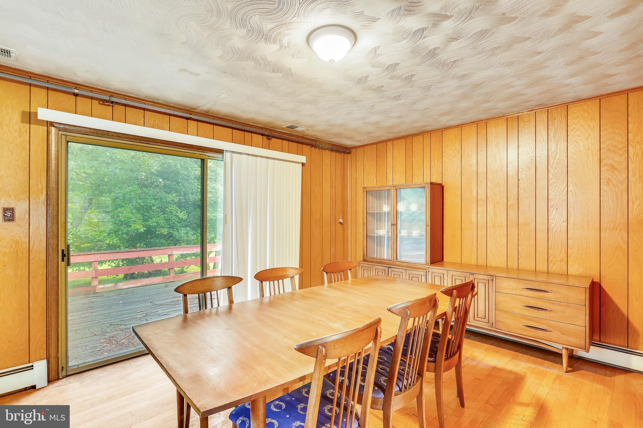 2122 Apple Tree Lane Silver Spring, MD 20905 - Photo 7 of 19 Dining Room with Sliding Glass Door to Deck