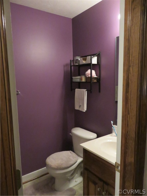 4097 Wakema Road West Point, VA 23181 - Photo 23 of 34 a bathroom with a toilet and a sink
