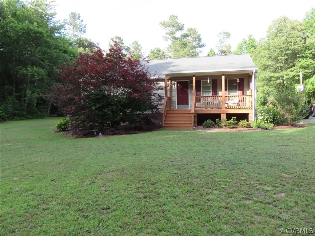 4097 Wakema Road West Point, VA 23181 - Photo 3 of 34 a view of house with a yard