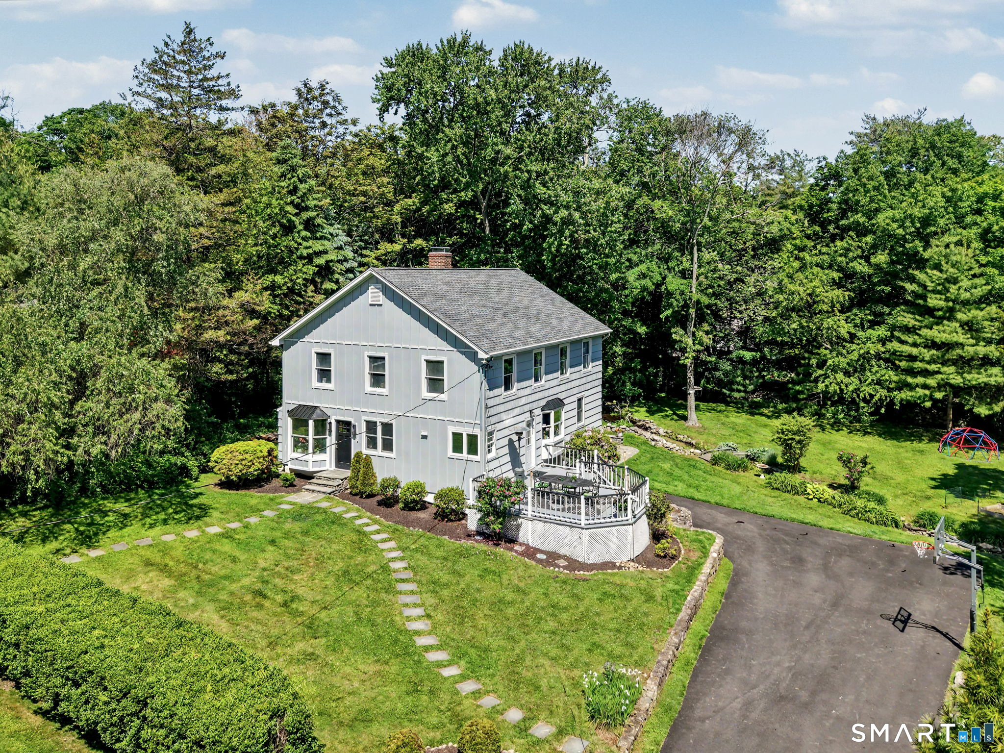 2 Rising Road Norwalk, CT 06850 - Photo 31 of 33 a house view with a garden space