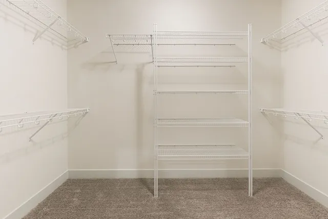 a view of a room with racks on the wall