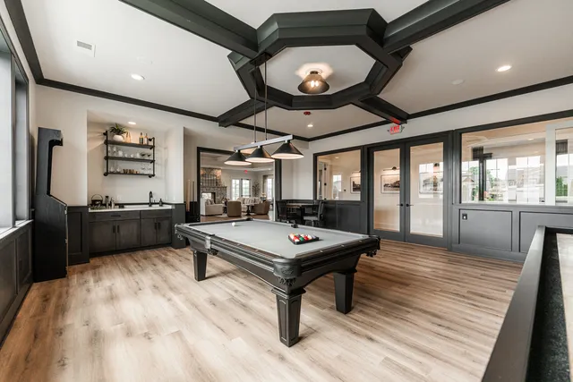 a lobby with furniture and wooden floor