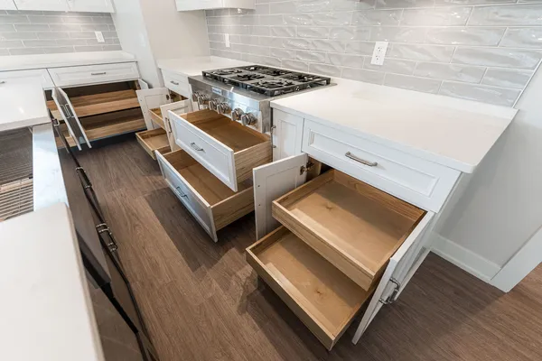 a kitchen with a stove and a microwave