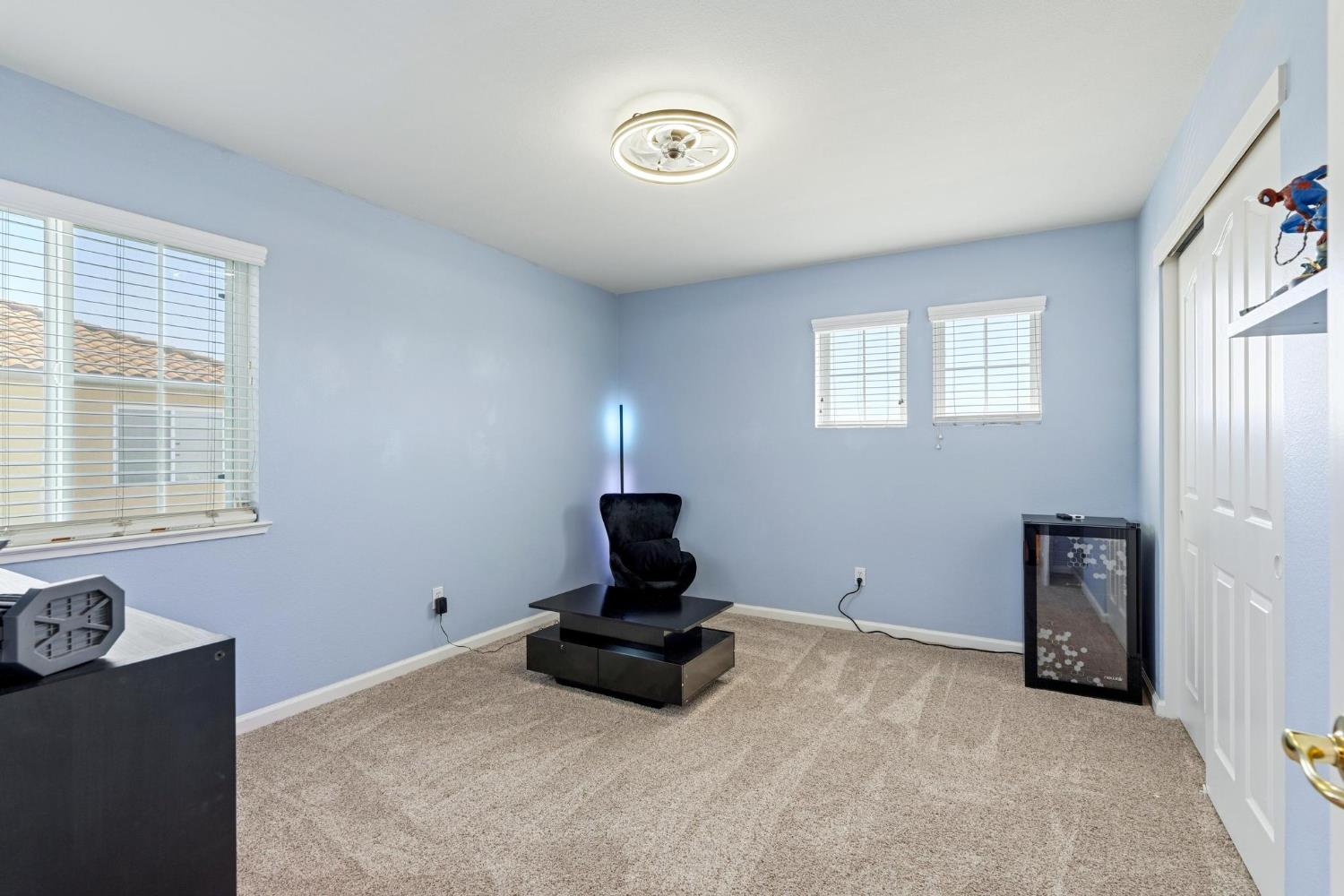 426 South Highland Avenue Ripon, CA 95366 - Photo 71 of 82 a bedroom with bed and window