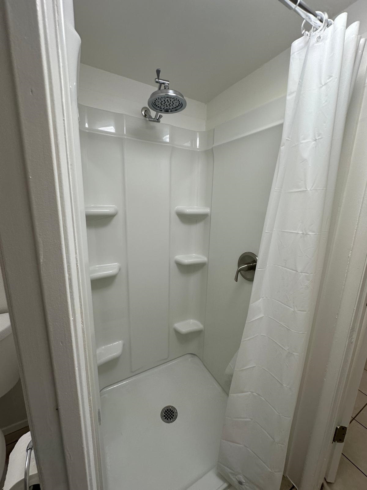 111 Kahului Beach Road, Unit C116 Kahului, HI 96732 - Photo 9 of 14 a bathroom with a shower and toilet
