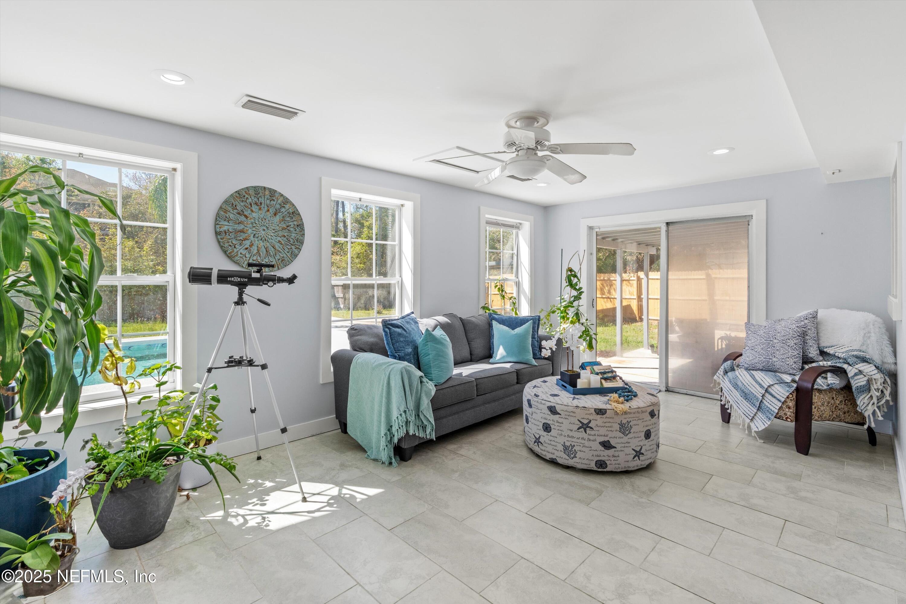 1216 Tumbleweed Drive Orange Park, FL 32065 - Photo 15 of 38 a living room with furniture and a large window