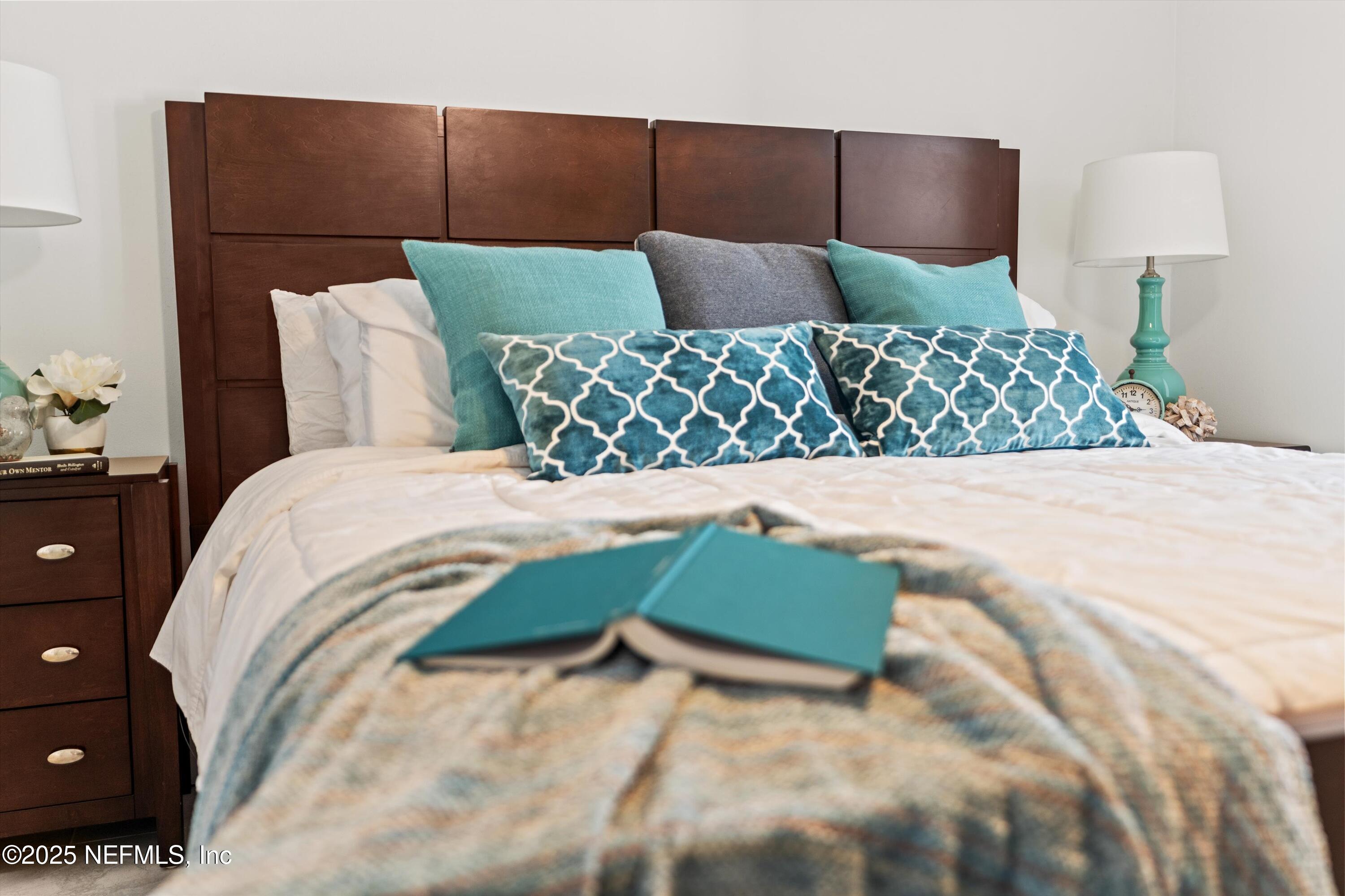 1216 Tumbleweed Drive Orange Park, FL 32065 - Photo 20 of 38 a bedroom with a bed and window