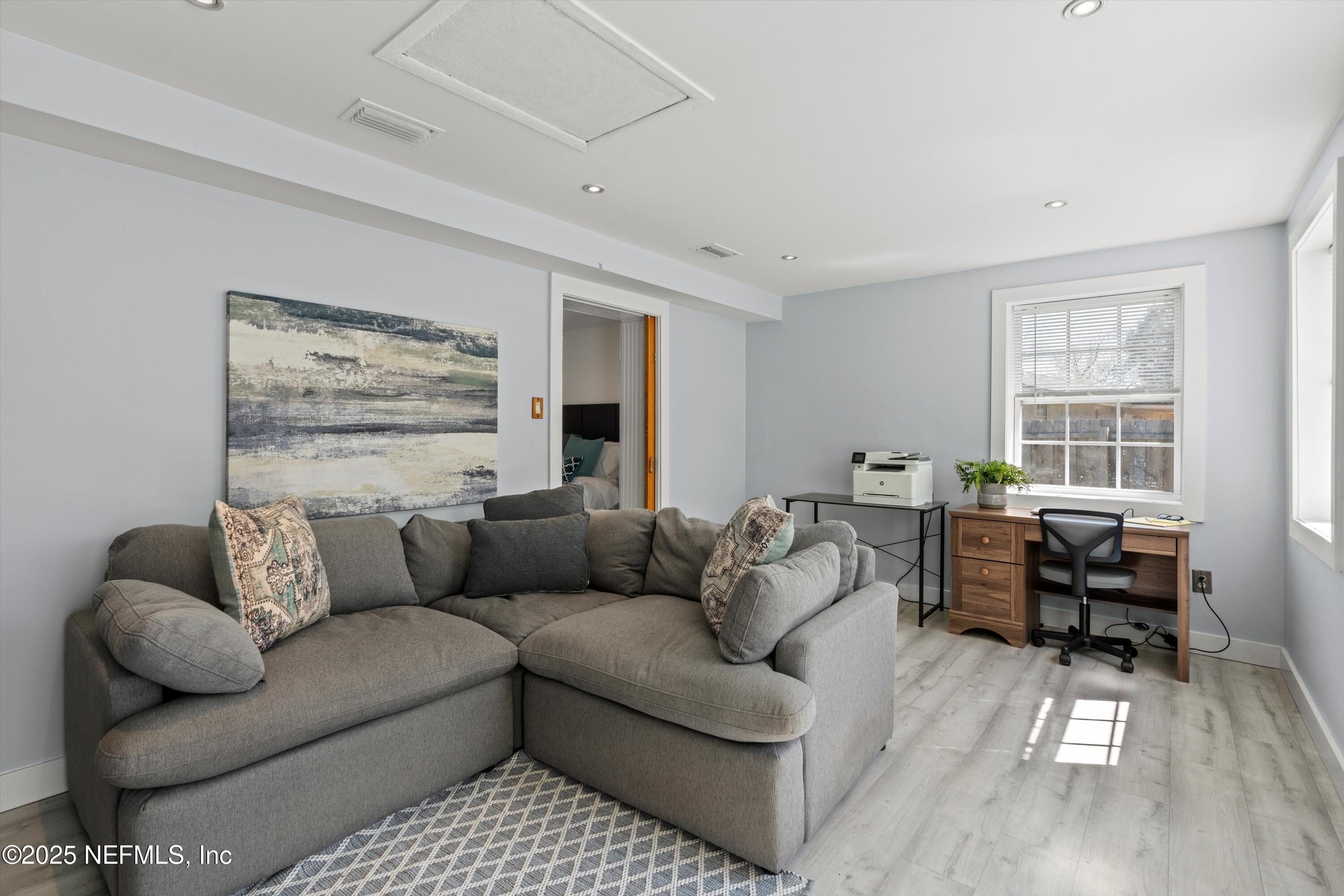 1216 Tumbleweed Drive Orange Park, FL 32065 - Photo 23 of 38 a living room with furniture and a couch