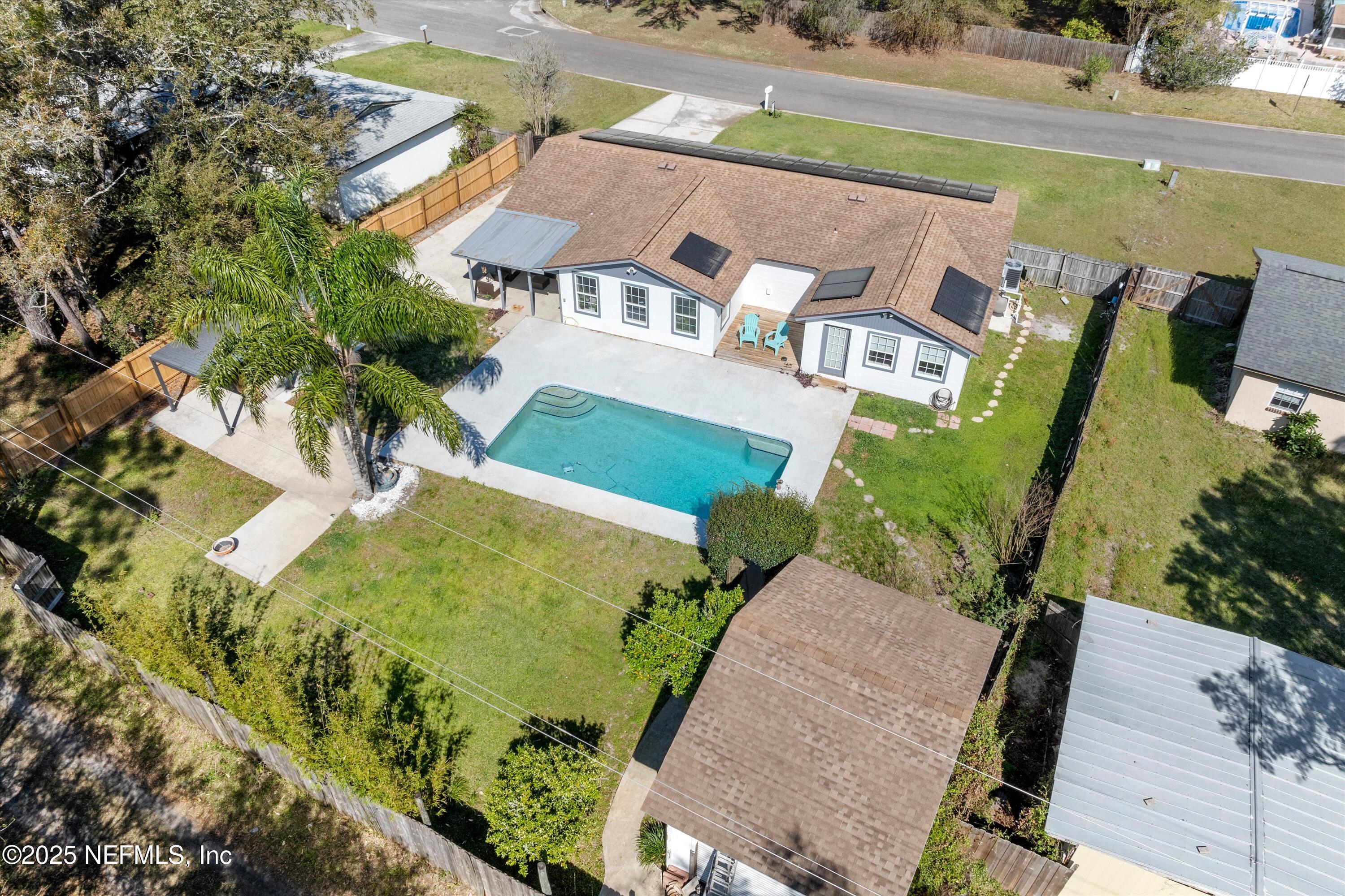 1216 Tumbleweed Drive Orange Park, FL 32065 - Photo 34 of 38 an aerial view of a house with a yard basket ball court and outdoor seating