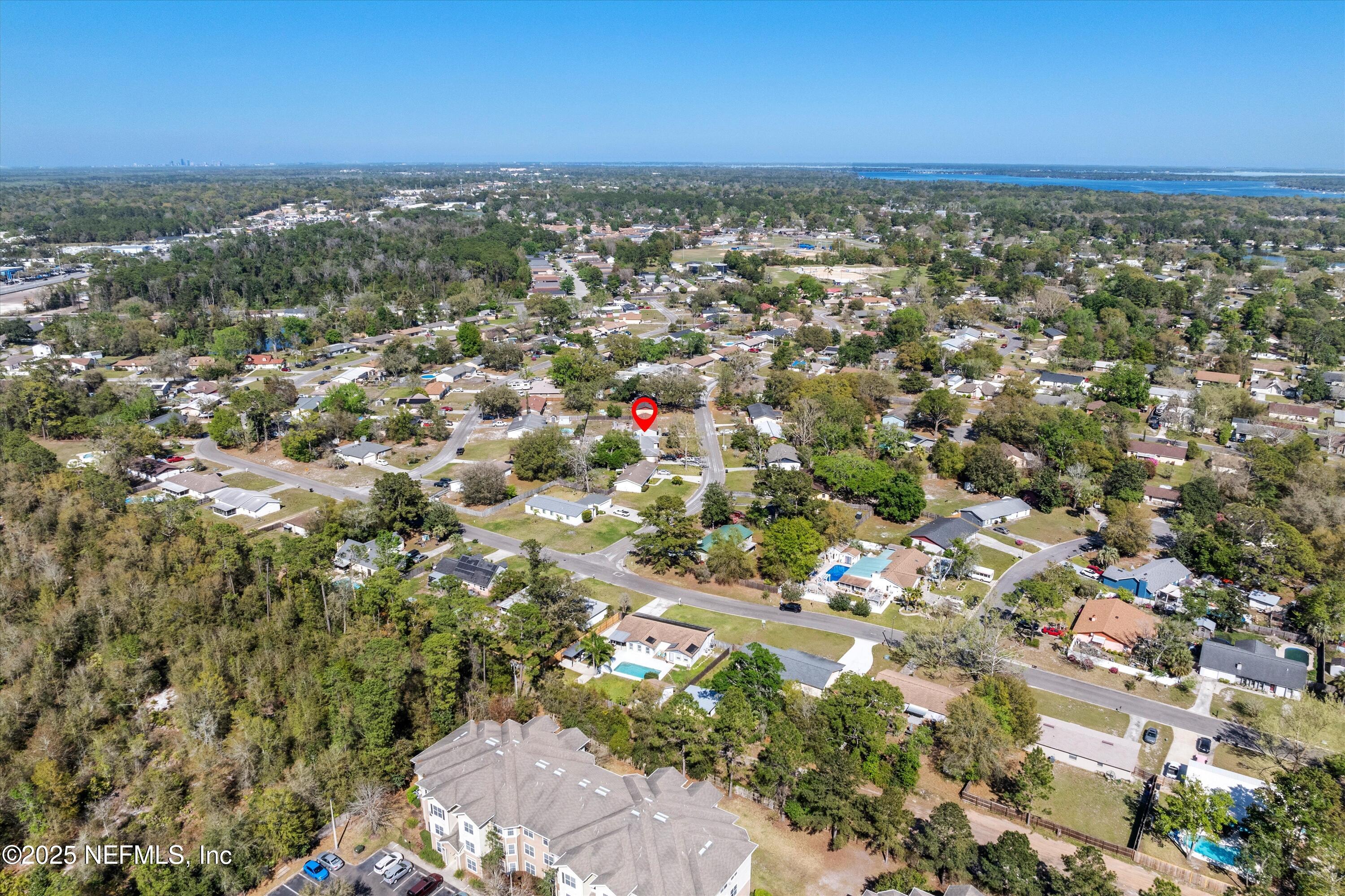 1216 Tumbleweed Drive Orange Park, FL 32065 - Photo 37 of 38 an aerial view of a houses with a yard