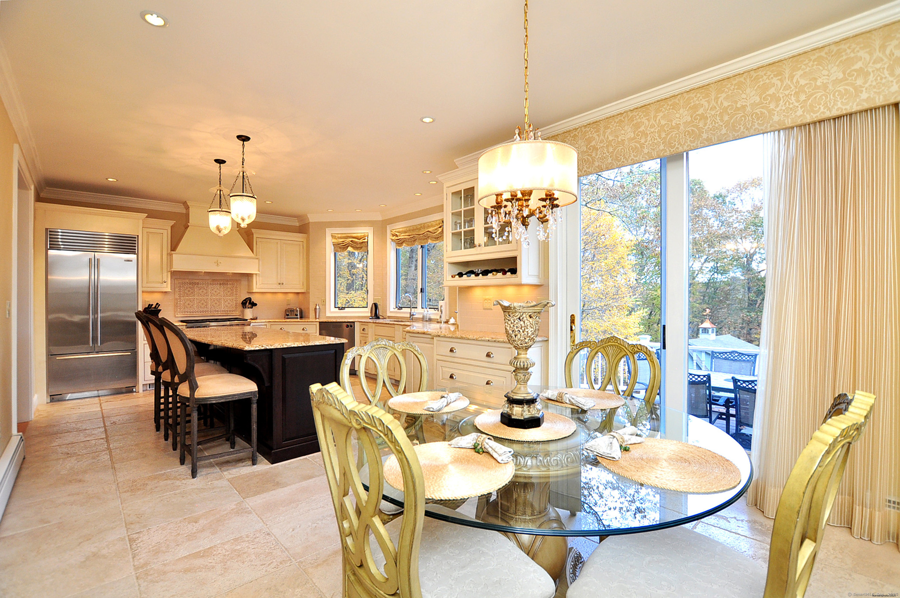 45 Lookout Landing Bolton, CT 06043 - Photo 14 of 39 a dining room with furniture a chandelier and wooden floor