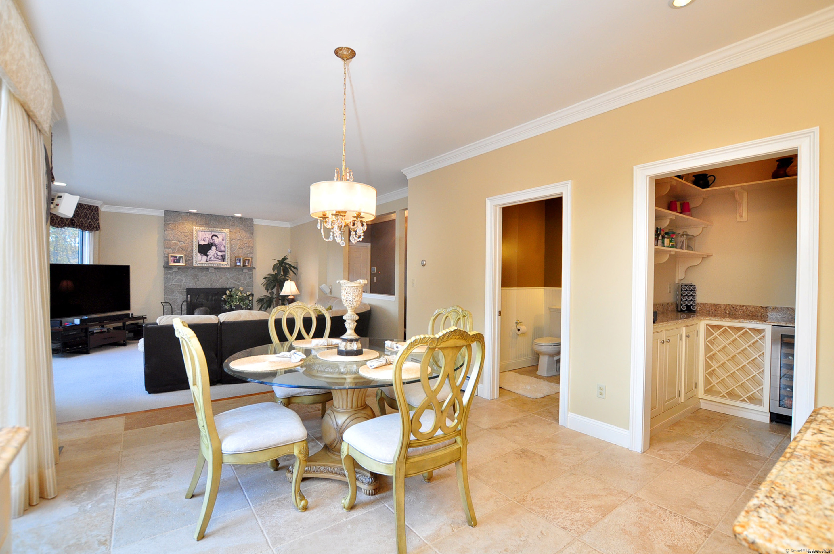 45 Lookout Landing Bolton, CT 06043 - Photo 17 of 39 a dining room with furniture and wooden floor