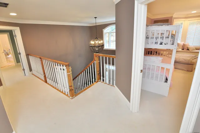 a view of a hallway with windows