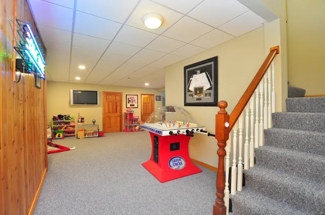 a hallway with toys and white walls